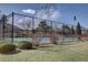 Enjoy a game of tennis on the community court, surrounded by lush greenery and mature trees at 8354 S Everett Way # C, Littleton, CO 80128