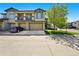 Inviting townhome with a two-car garage and lovely curb appeal at 13020 Grant W Cir # A, Thornton, CO 80241