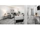 Finished basement with comfortable seating, modern decor, and ample space at 530 Everett St, Lakewood, CO 80226