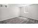 Finished basement bedroom with carpet flooring and natural light from the window at 530 Everett St, Lakewood, CO 80226