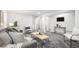 Finished basement with gray carpet, modern decor, television, and recessed lighting at 530 Everett St, Lakewood, CO 80226