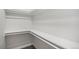 Walk-in closet with built-in shelving and plenty of storage space at 530 Everett St, Lakewood, CO 80226