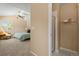 The main bedroom opens up to this well lit ensuite bathroom with shower at 2640 Overlook Dr, Broomfield, CO 80020