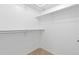 Spacious walk-in closet with shelving, providing ample storage space and organization at 2640 Overlook Dr, Broomfield, CO 80020