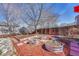 Landscaped backyard with garden beds and wood fencing at 12868 Capital Creek St, Parker, CO 80134