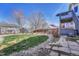 Expansive backyard featuring lush greenery, mature trees, and a serene ambiance at 12868 Capital Creek St, Parker, CO 80134