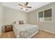 Cozy bedroom with natural light and carpet flooring at 12868 Capital Creek St, Parker, CO 80134