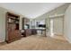Inviting office space featuring a large window, functional desk setup, and stylish dark wood furniture at 12868 Capital Creek St, Parker, CO 80134