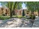 Beautifully landscaped courtyard with plenty of seating and mature trees at 1060 S Parker Rd # 25, Denver, CO 80231