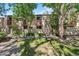 Well-manicured lawn and mature trees surround this charming condo community at 1060 S Parker Rd # 25, Denver, CO 80231