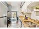 Open kitchen layout with granite countertops, stainless steel appliances, and white cabinets at 1060 S Parker Rd # 25, Denver, CO 80231