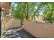Cozy patio with views of the community's courtyard and mature trees at 1060 S Parker Rd # 25, Denver, CO 80231