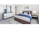 Modern bedroom with stylish decor, sleek furniture, and beautiful artwork creates a cozy retreat at 10185 W 25Th Ave # 33, Lakewood, CO 80215