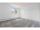 Comfortable bedroom with neutral walls, plush carpeting, and built-in closets offers ample storage at 10185 W 25Th Ave # 33, Lakewood, CO 80215