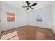 Spacious bedroom with hardwood floors and windows with exterior views at 1467 Clermont St, Denver, CO 80220