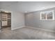 Finished basement bedroom featuring a closet, window, neutral carpet, and recessed lighting at 4431 W Jamison Pl, Littleton, CO 80128
