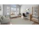 Comfortable office with large windows, wood floors, and modern decor at 4431 W Jamison Pl, Littleton, CO 80128