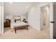 Charming bedroom with white walls, comfy bed, stylish decor, and bathroom access at 1346 N Knox Ct, Denver, CO 80204