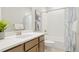 Bright bathroom with white subway tile surround and modern fixtures at 21209 E 62Nd Ave, Aurora, CO 80019