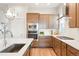 Well-equipped kitchen features ample counter space, stainless steel appliances, and modern fixtures at 21209 E 62Nd Ave, Aurora, CO 80019
