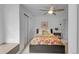 Comfortable bedroom features a ceiling fan, closet, and modern decor at 1644 S Garfield St, Denver, CO 80210