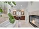 Luxurious main bathroom featuring double sinks, fireplace, and oversized bathtub at 1644 S Garfield St, Denver, CO 80210