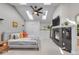 Beautiful main bedroom with vaulted ceiling, skylights, fireplace, and ensuite bathroom at 1644 S Garfield St, Denver, CO 80210