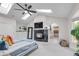 Vaulted ceilings, skylights, and a fireplace add to the charm of this bright main bedroom at 1644 S Garfield St, Denver, CO 80210