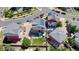 Birds eye view of property showing backyard with a green lawn, a hot tub, and an outdoor lounge area at 18651 E 53Rd Ave, Denver, CO 80249