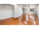 Spacious basement features hardwood floors, recessed lighting and natural light from the windows at 18651 E 53Rd Ave, Denver, CO 80249