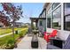 Outdoor patio with comfortable seating around a fire pit, perfect for entertaining and relaxation at 6237 Stable View St, Castle Pines, CO 80108