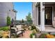 Inviting backyard patio with comfortable seating, perfect for relaxation and outdoor living at 6237 Stable View St, Castle Pines, CO 80108