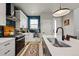Well-equipped kitchen boasting modern appliances, sleek countertops, and ample cabinet space at 6237 Stable View St, Castle Pines, CO 80108