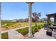 Picturesque patio view overlooking the open space and neighborhood at 6237 Stable View St, Castle Pines, CO 80108