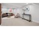 Cozy finished basement with neutral carpet, stylish furniture, and recessed lighting at 660 S Clarkson St, Denver, CO 80209