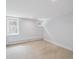 Empty basement with carpet, recessed lighting, and multiple windows at 660 S Clarkson St, Denver, CO 80209