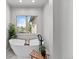 Bright bathroom with modern tub, elegant fixtures, and natural light, designed for relaxation and comfort at 422 Suffolk Ln, Castle Rock, CO 80108