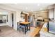 Kitchen featuring stainless appliances, granite countertops, double oven, and breakfast bar at 7925 W Layton Ave # 500, Littleton, CO 80123