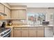 Kitchen featuring stainless appliances, granite countertops and natural light at 7925 W Layton Ave # 500, Littleton, CO 80123