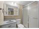 Basement bathroom with shower stall, toilet and vanity at 8111 S Marion Ct, Centennial, CO 80122