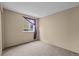 Empty bedroom with neutral wall and carpet at 8111 S Marion Ct, Centennial, CO 80122