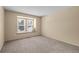 Simple bedroom with a window seat and neutral color scheme at 8111 S Marion Ct, Centennial, CO 80122