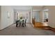 Dining area with hardwood floors, chandelier, and window seating at 8111 S Marion Ct, Centennial, CO 80122