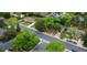 Aerial view of a suburban home with mature trees and landscaping at 9025 W 4Th Ave, Lakewood, CO 80226