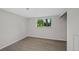 Well-lit bedroom with hardwood floors and a window view to the outside at 9025 W 4Th Ave, Lakewood, CO 80226