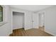 Cozy bedroom with hardwood floors, closet space, and bright natural light at 9025 W 4Th Ave, Lakewood, CO 80226