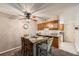 Cozy dining area featuring a ceiling fan with open access to kitchen at 2208 Emery St, Longmont, CO 80501
