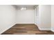 Finished basement area featuring new laminate flooring, fresh paint and closet at 7891 Maria St, Westminster, CO 80030