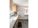 Kitchen featuring granite countertops and wood cabinetry at 7891 Maria St, Westminster, CO 80030