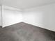 An empty bedroom featuring plush carpeting and a spacious closet at 480 S Marion Pkwy # 1202, Denver, CO 80209